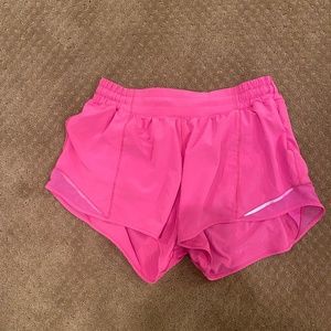 Sonic pink hotty hot 4 inch Lululemon shorts